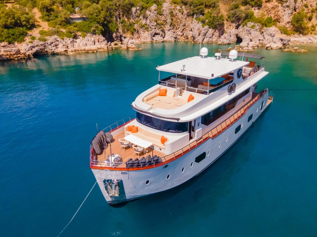 The custom-built simay m luxury trawler yacht featuring 5 cabins for 10 guests, showcasing its expansive decks and robust design for comfortable cruising in fethiye and gocek.