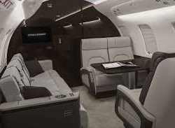 Exterior view of the Bombardier Challenger 650 heavy private jet prepared for a transcontinental VIP charter.