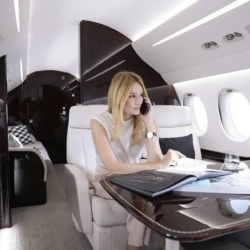 İnterior profile of the Dassault Falcon 8X ultra-long-range jet on the tarmac during a VIP mission.