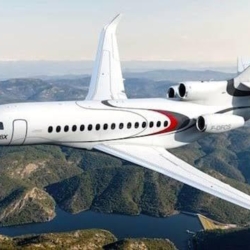 Exterior profile of the Dassault Falcon 8X ultra-long-range jet on the tarmac during a VIP mission.