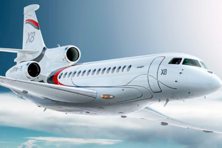 Exterior profile of the dassault falcon 8x ultra-long-range jet on the tarmac during a vip mission.